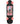 A longboard skateboard with a black wood-grain deck, featuring a graphic print of green cacti under a white draped sheet on a pink background. The skateboard is fitted with pink marbled wheels and black trucks, shown against a plain white background.