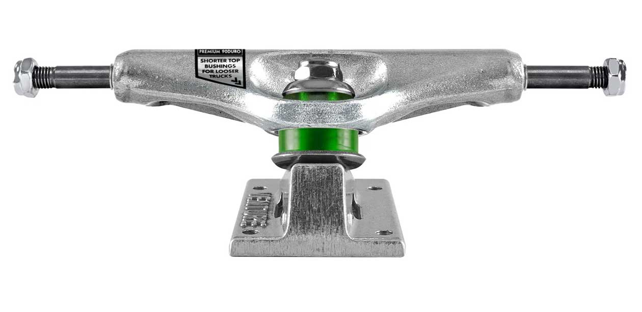 Skateboard truck with green axle on a white background